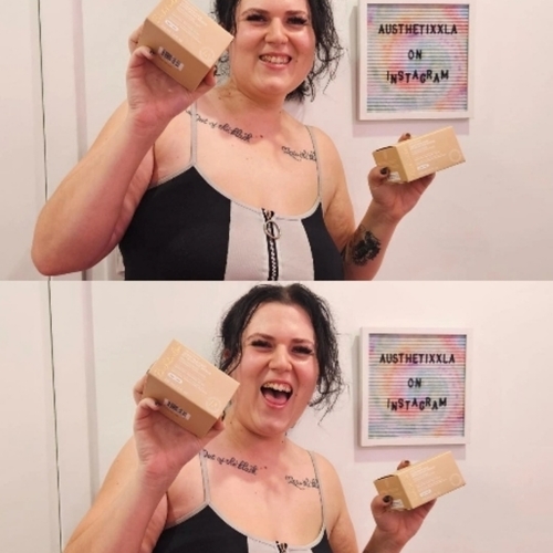 Christina smiling in her studio